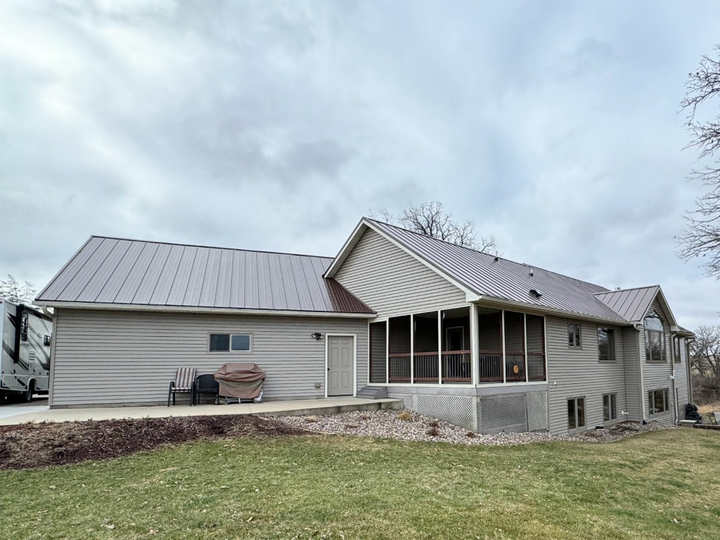 06-After-Standing-Seam-Steel-Roofing-Brown-Steel-Siding-Beige-Back-Corner-Detail-Fountain-MN (1)