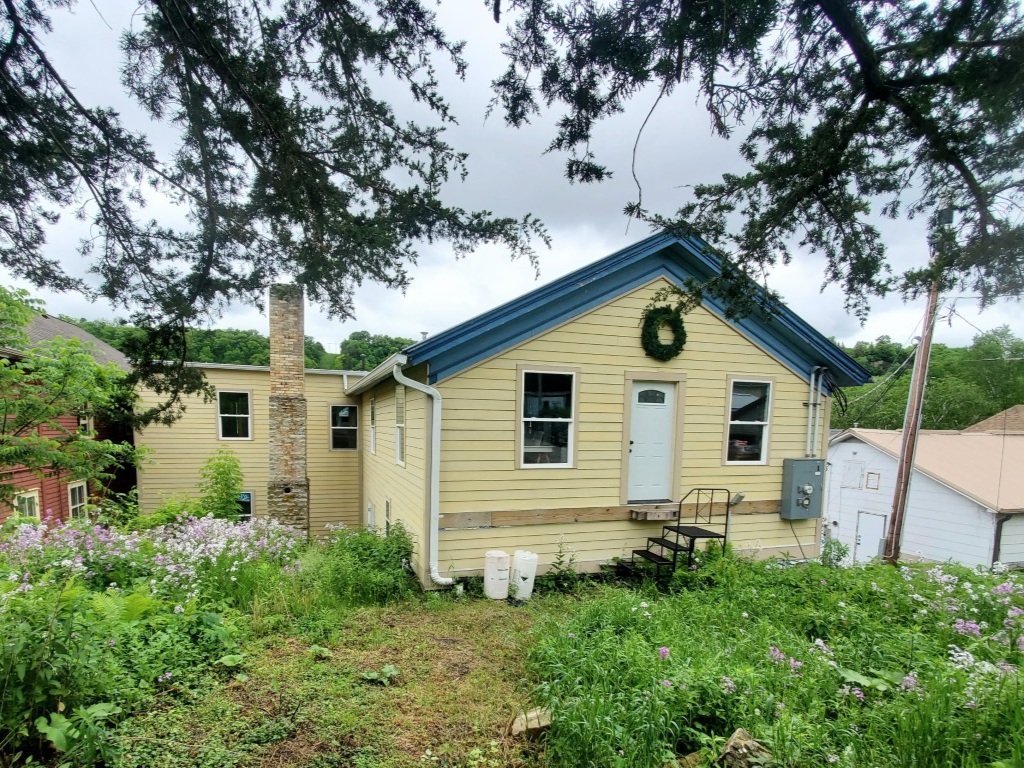 blue-hotel-lanesboro-mn-after-rear-corner-new-siding-windows.jpg (1)