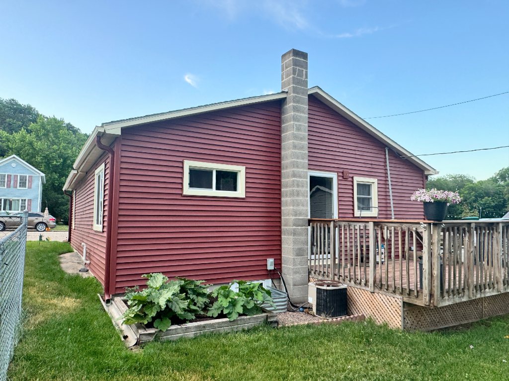 Red house side deck wooden extension